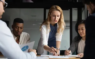 woman leading business meeting