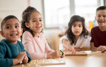 prek students working on a puzzle