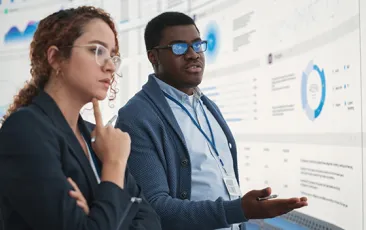 Thoughtful colleagues looking at data