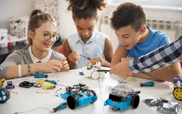 Kids working on a robotics project