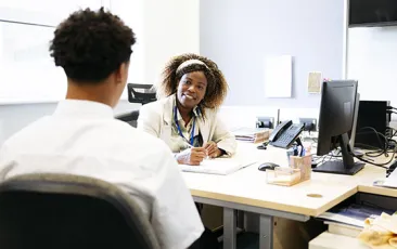 Doctor and patient in conversation in office