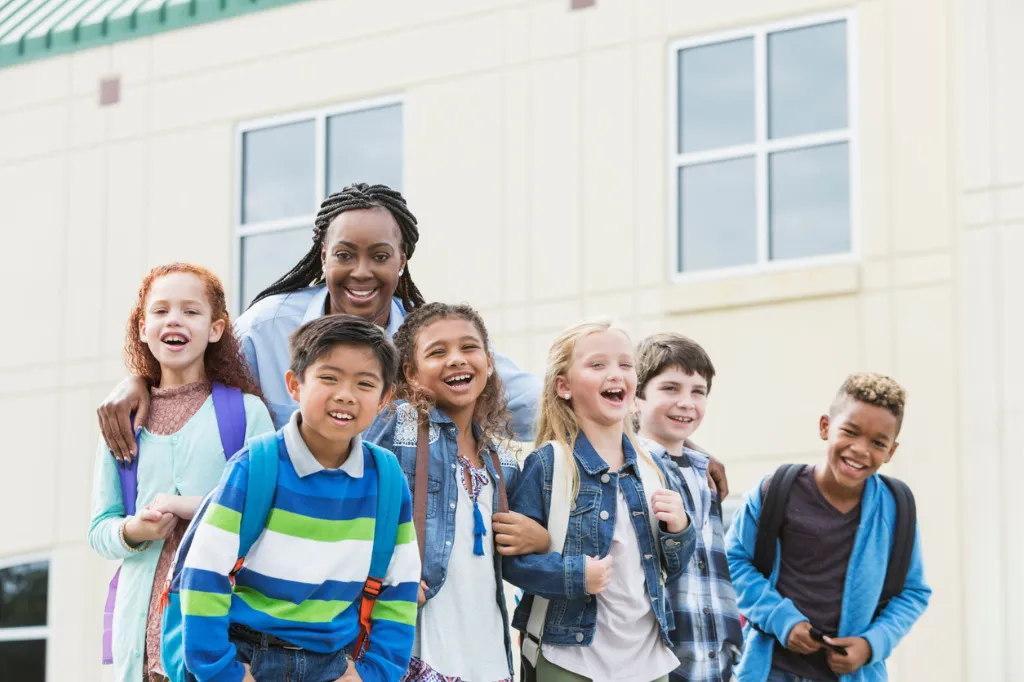 Teacher with students outside