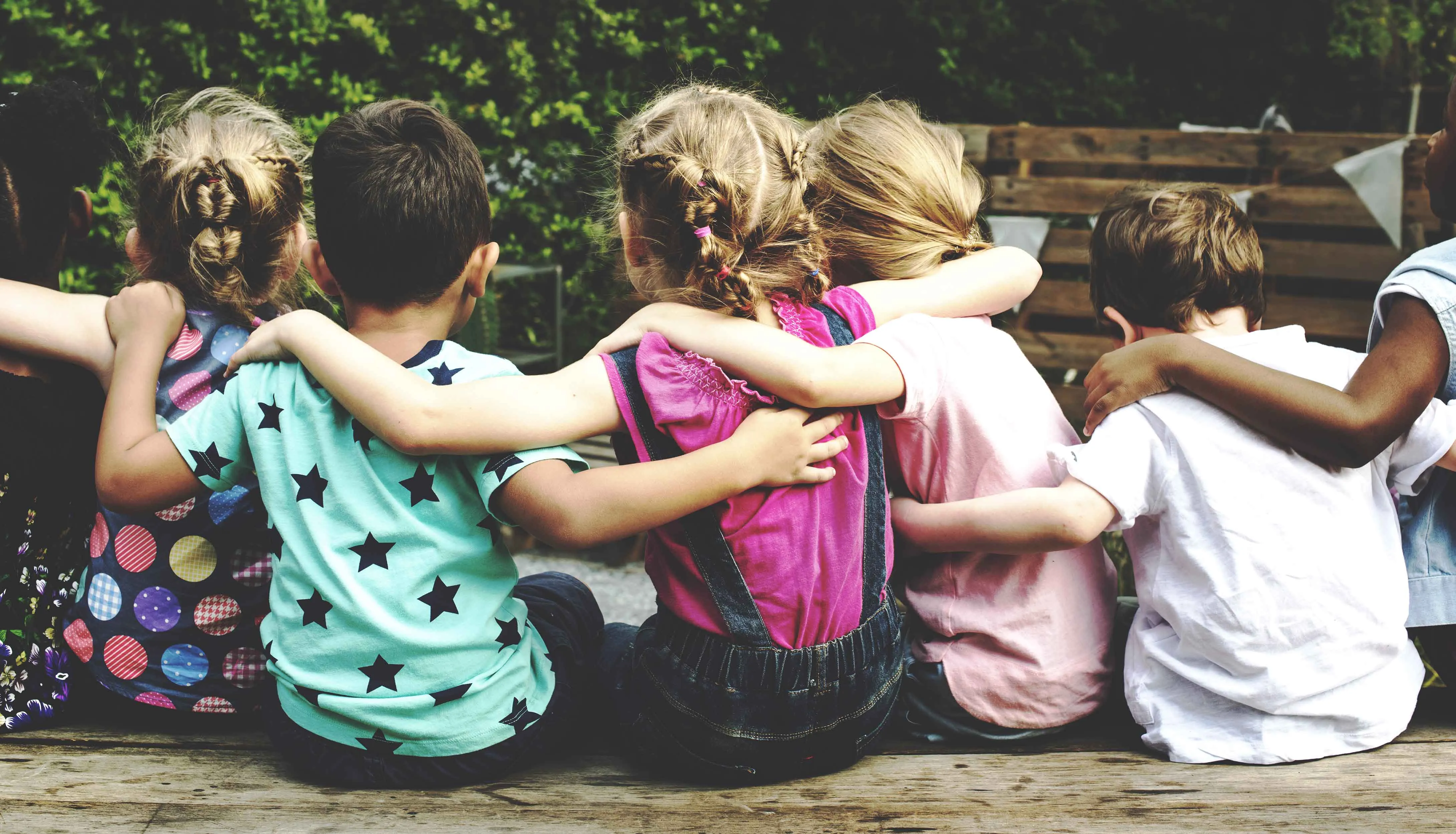 Children arm in arm