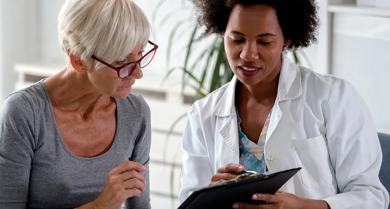 Doctor and older patient