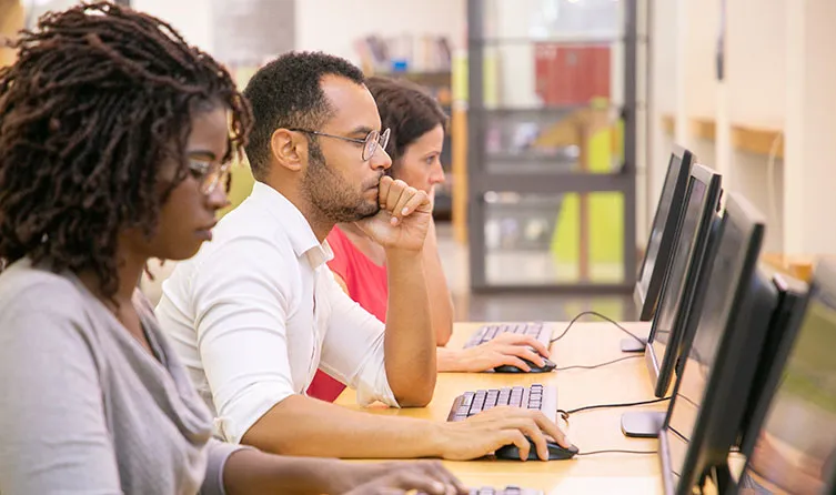 Diverse coworkers at computers