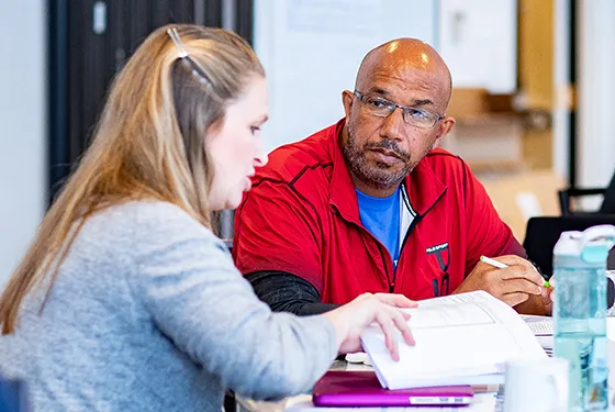 Teacher colleagues in discussion
