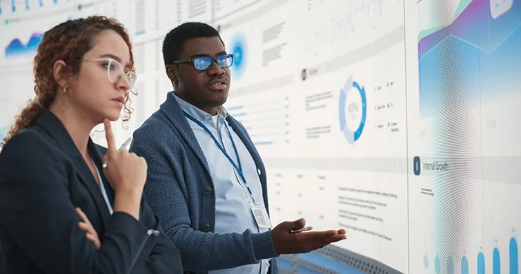 Thoughtful colleagues looking at data