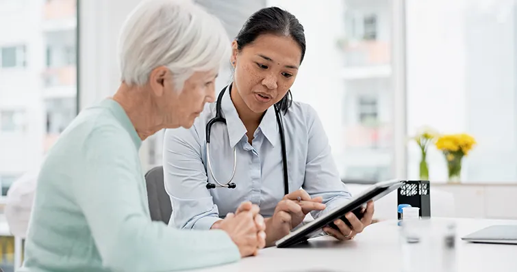 Doctor with older patient