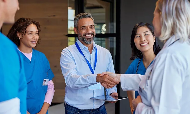 Health care workers in conversation