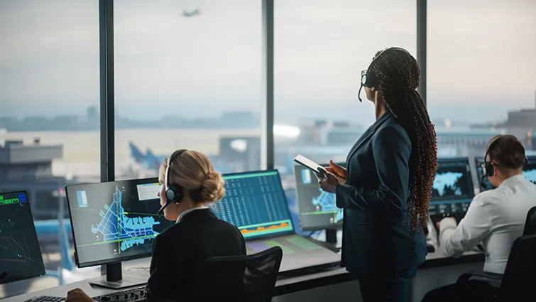 air traffic controllers overlooking airport