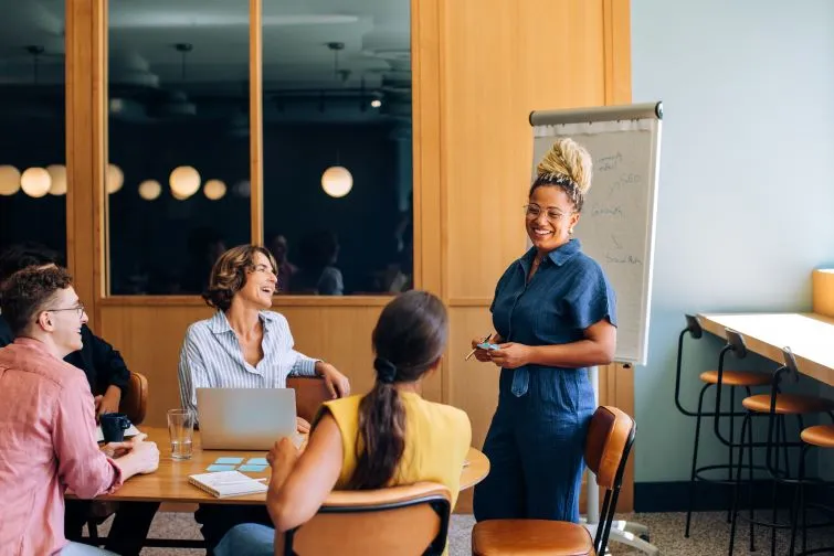 Teachers meeting in conference room
