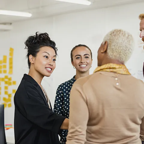 Diverse group of coworkers in discussion 
