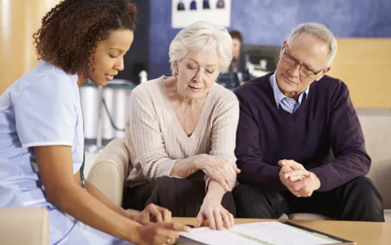 Health care worker with older couple