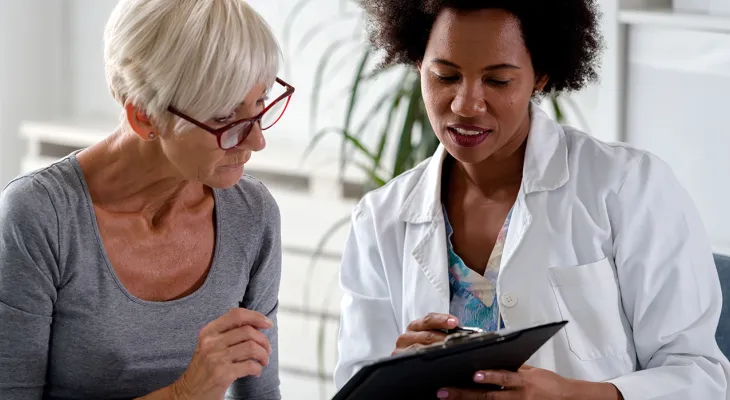 Doctor and older patient