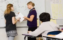 Teachers at whiteboard