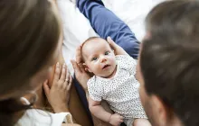 Image of baby with parents