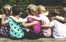 Children arm in arm