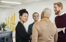 Diverse group of coworkers in conversation
