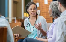 Doctor talking with patients