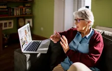 Older patient having a telehealth call with physician