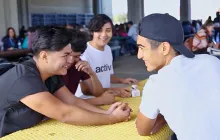 Teen students laughing together