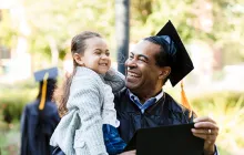 Little girl makes graduating grandfather laugh