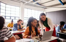 Computer science teacher with high school student