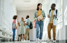 High school students talking in hallway