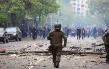 Soldier in war zone after bombing