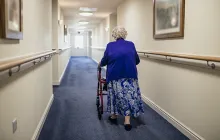 Woman with walker in nursing home