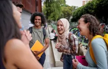 Young students laughing together on campus
