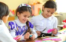 students cut papers