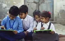 Indian schoolchildren writing on slates