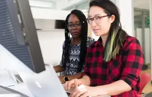 Women working at a computer