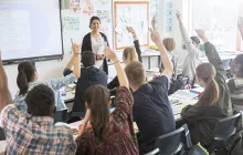 Teacher in high school classroom