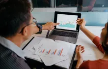 Researchers looking at data