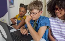 Middle school students at school computer
