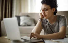 Young woman at her laptop