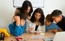 Middle school students working on a project