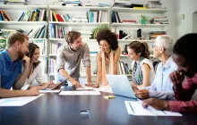 Staff meeting at conference table