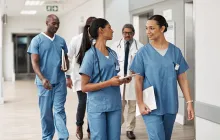 health care workers walking in hospital