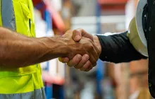 Union workers shake hands