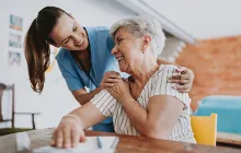 Healthcare worker and older patient