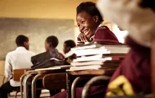 young african girl laughing in class