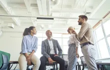 group of businesspeople in conversation