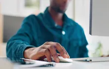 Man clicking on submit