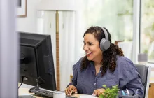 Adult learner using desktop computer