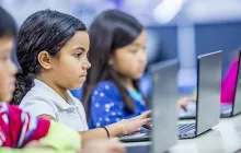 Elementary students in computer class