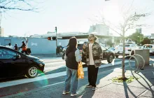 Friends laughing on the street in San Francisco