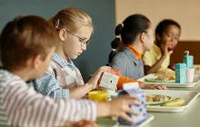 Girl eating school lunch